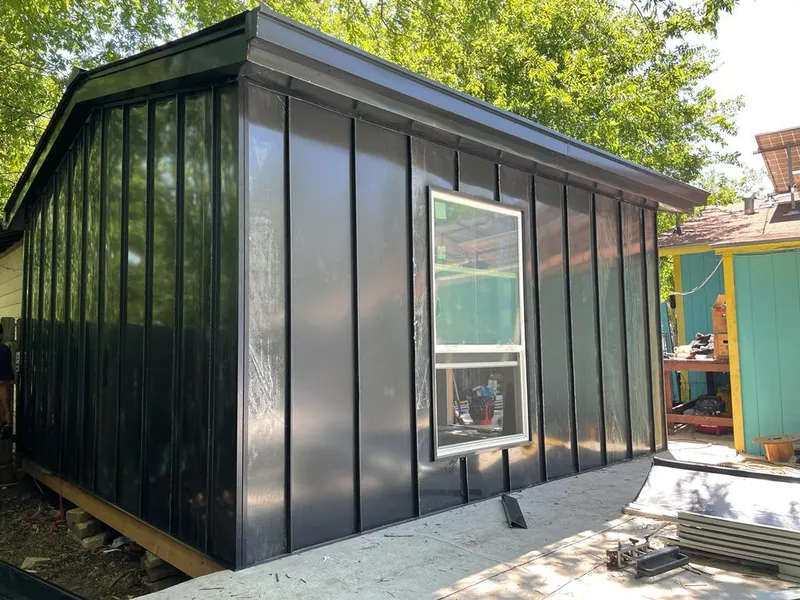 Black standing seam metal wall panels for Metal Roof Installation in Kings Park West